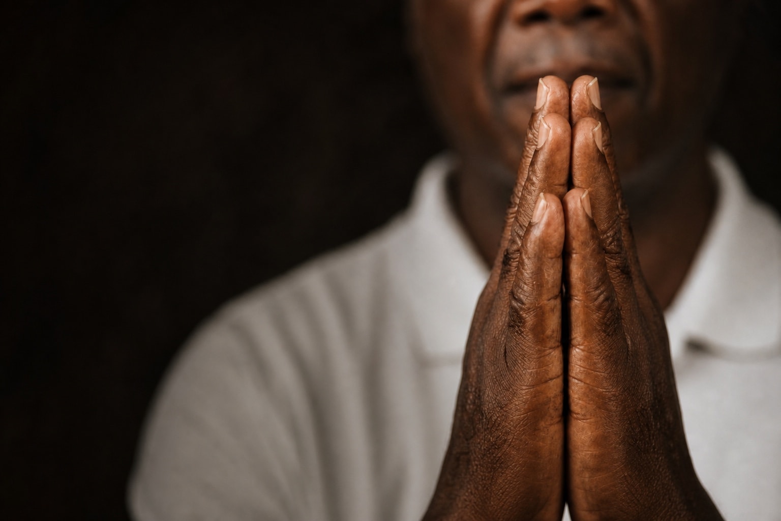 Hands folded in prayer
