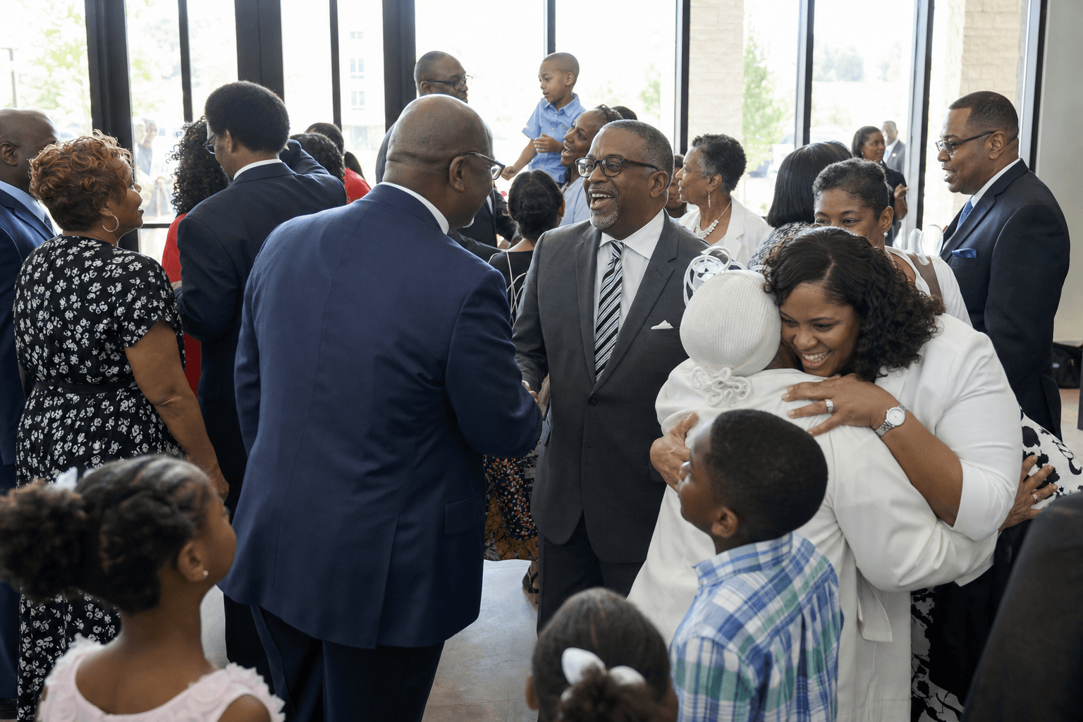 Congregation greeting and embracing one another after worship